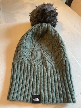 The North Face Green Cable Knit Beanie with Pom